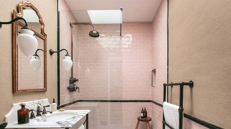 Image may contain: Indoors, Sink, Sink Faucet, Art, Painting, Bathroom, and Room