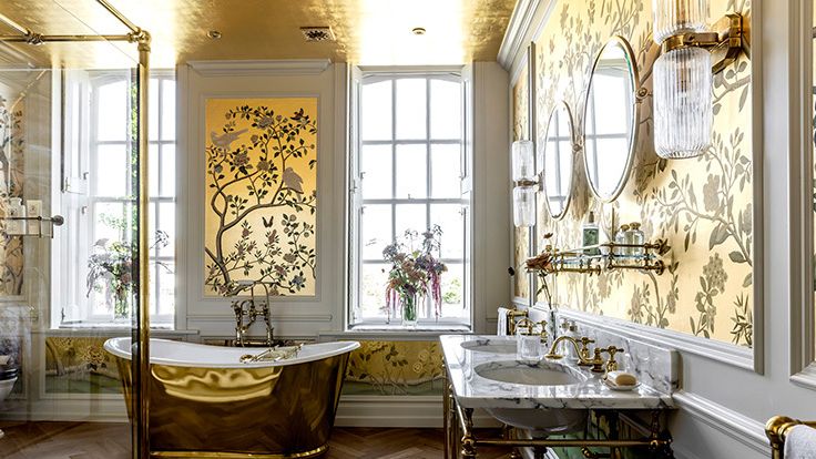 Image may contain: Indoors, Interior Design, Sink, Bathing, Bathtub, Person, Tub, and Sink Faucet