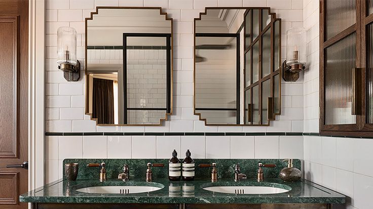 Image may contain: Sink, Sink Faucet, Lamp, and Cup