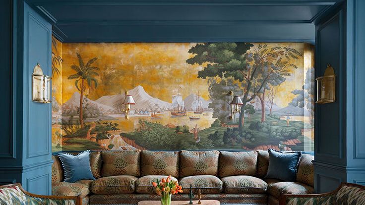 Image may contain: Home Decor, Couch, Furniture, Architecture, Building, Indoors, Living Room, Room, Art, Painting, and Lamp