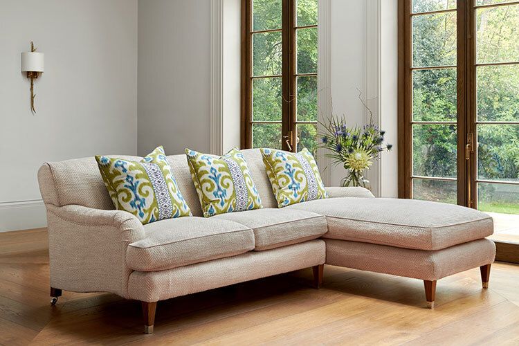 Image may contain: Couch, Furniture, Cushion, Home Decor, and Pillow