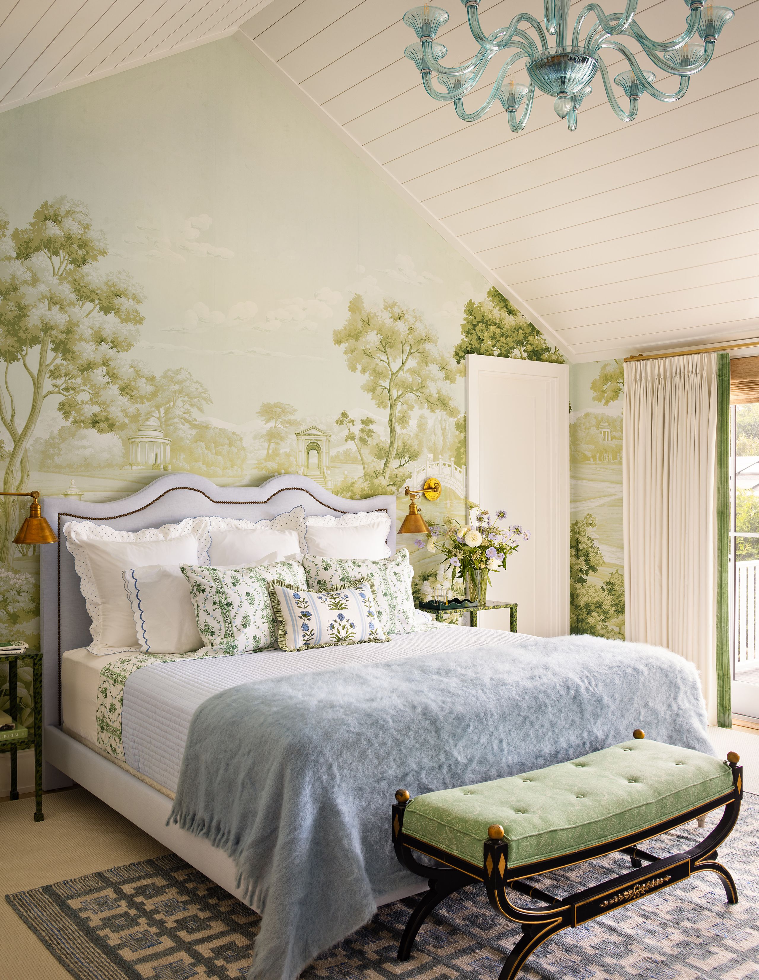 Image may contain: Lamp, Home Decor, Bed, Furniture, Bench, Cushion, Chandelier, Indoors, Interior Design, Bedroom, and Room