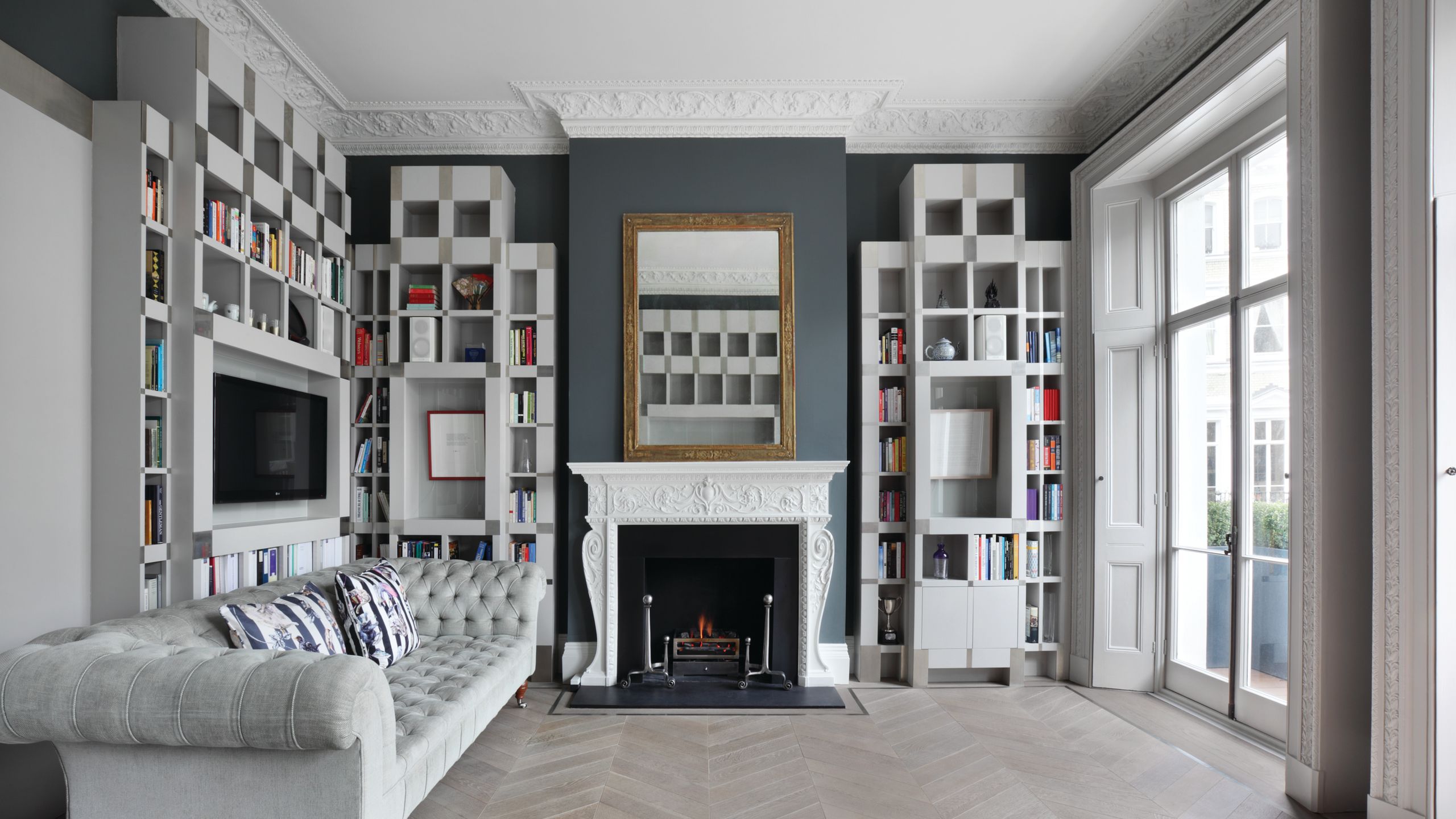 Image may contain: Fireplace, Indoors, Interior Design, Home Decor, Architecture, Building, Furniture, Living Room, and Room