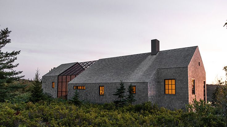 Image may contain: Architecture, Building, Cottage, House, Housing, Light, Traffic Light, and Cabin