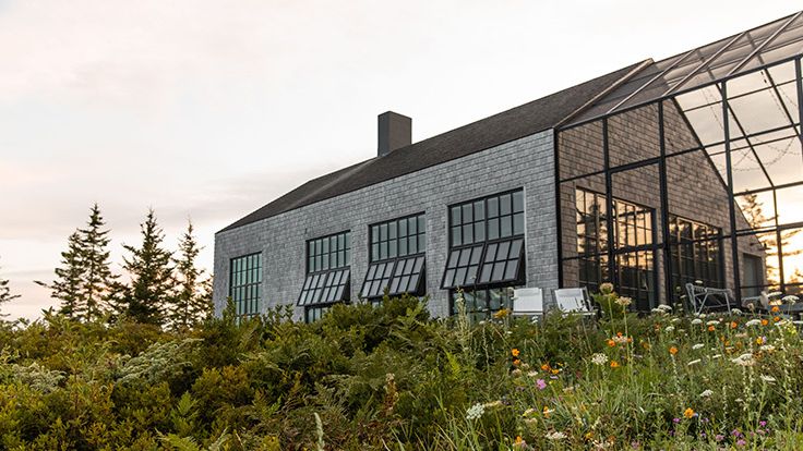 Image may contain: Garden, Nature, Outdoors, Plant, Tree, Conifer, Gardening, Architecture, Building, and Office Building