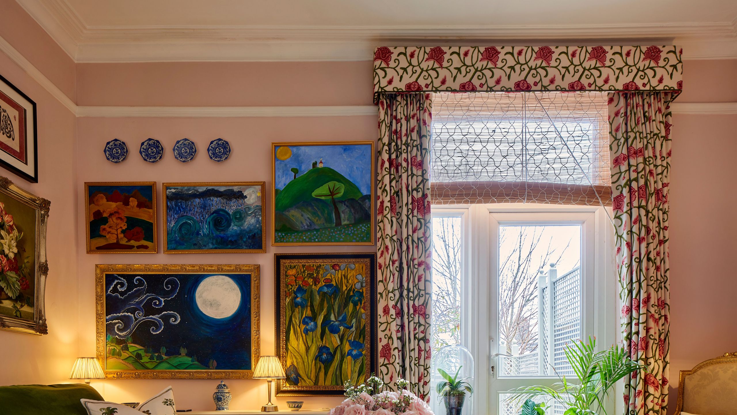 Image may contain: Plant, Home Decor, Lamp, Furniture, Art, Painting, Couch, Architecture, Building, Indoors, and Living Room