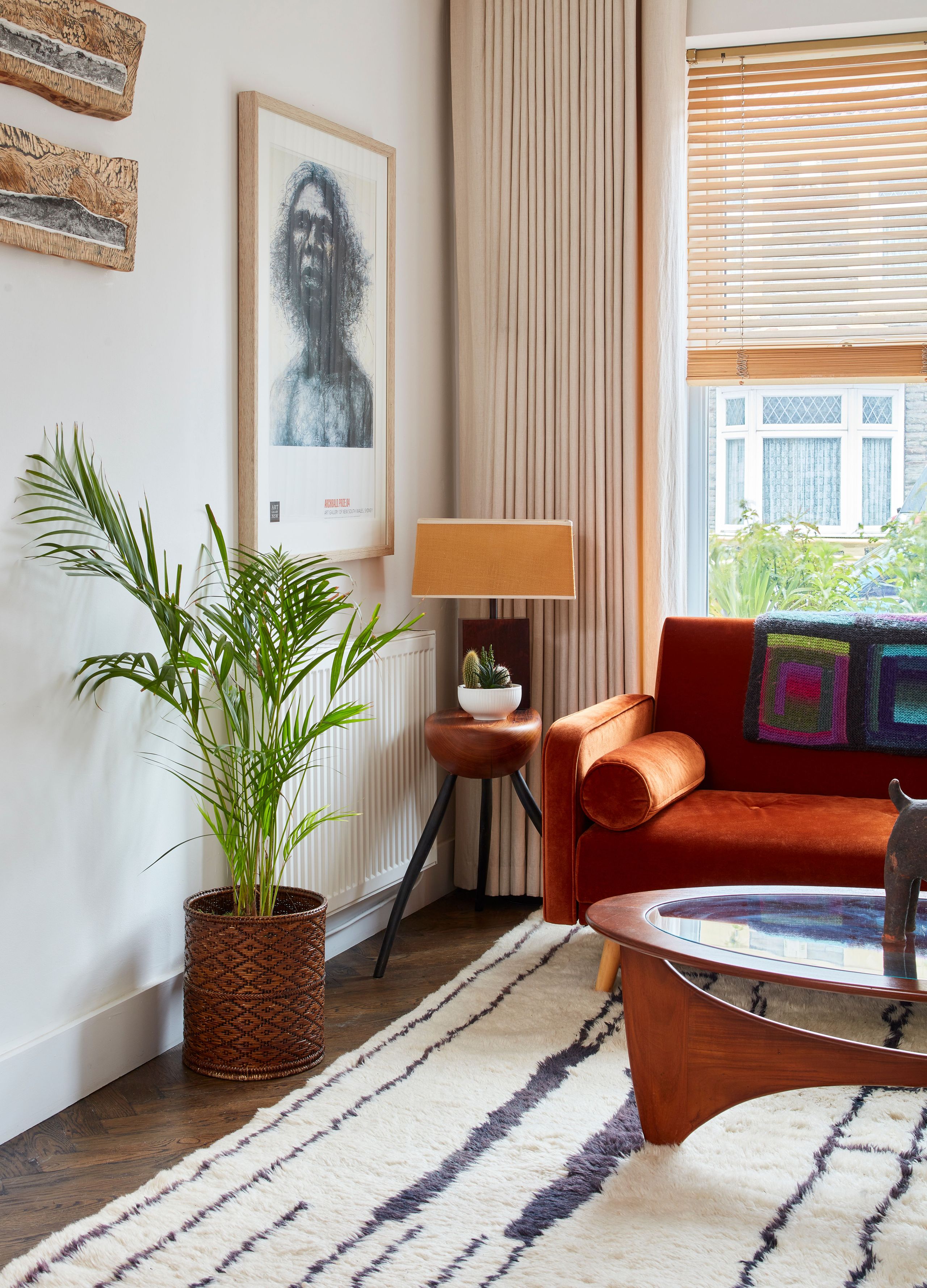 Image may contain: Home Decor, Indoors, Interior Design, Plant, Architecture, Building, Furniture, Living Room, Room, and Rug