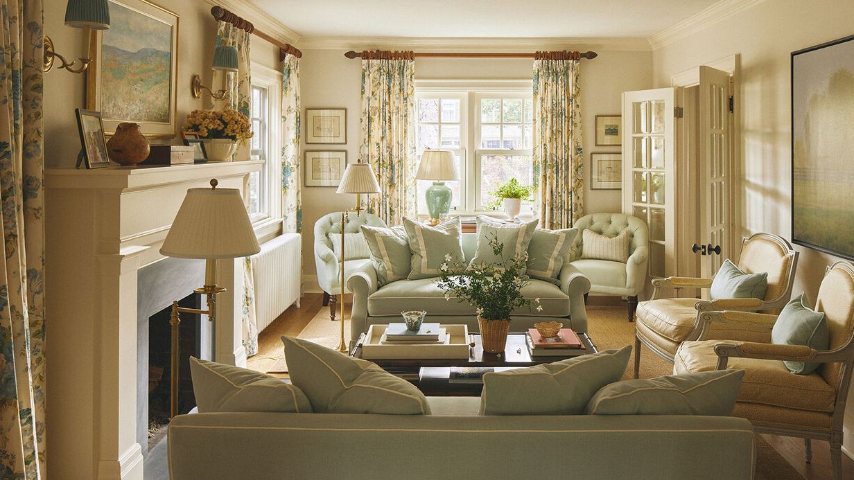 Image may contain: Home Decor, Lamp, Architecture, Building, Furniture, Indoors, Living Room, Room, Plant, Couch, and Table