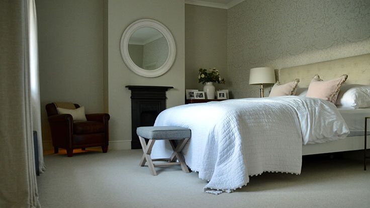 Image may contain: Lamp, Bed, Furniture, Floor, Bedroom, Dorm Room, Indoors, Room, Home Decor, Chair, and Flooring