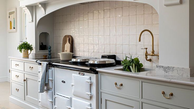 Image may contain: Indoors, Kitchen, Sink, Sink Faucet, Interior Design, Home Decor, Rug, and Cooktop