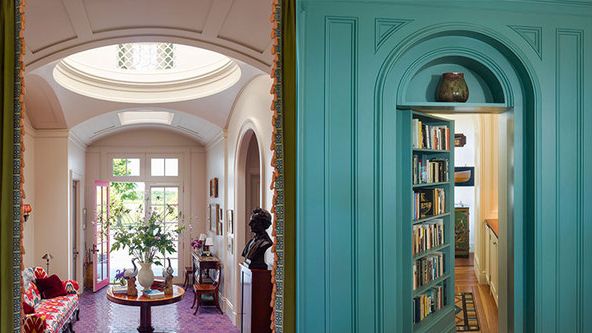 Image may contain: Person, Home Decor, Rug, Desk, Furniture, Table, Indoors, Interior Design, Chair, Door, and Couch