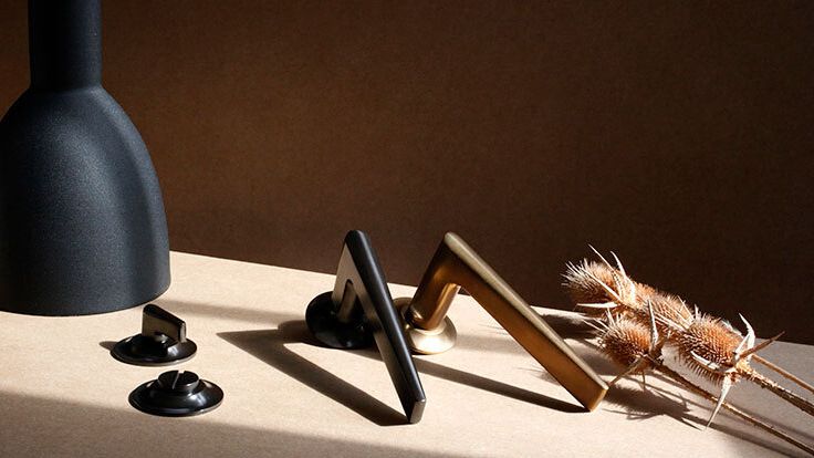 Image may contain: Lamp, Electronics, Desk, Furniture, and Table