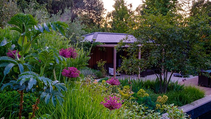 Image may contain: Garden, Nature, Outdoors, Backyard, Yard, Plant, Vegetation, Grass, Architecture, Building, and Cottage