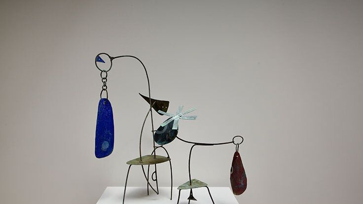 Image may contain: Art, Jar, Pottery, Vase, Chair, Furniture, Handicraft, Accessories, Earring, and Jewelry