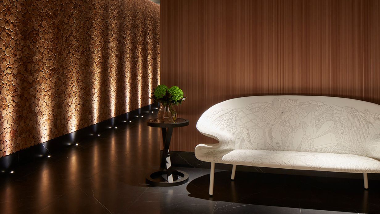 Image may contain: Indoors, Interior Design, Floor, Desk, Furniture, Table, Architecture, Building, Living Room, and Room