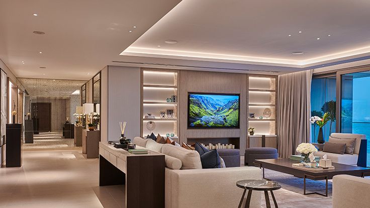 Image may contain: Architecture, Building, Furniture, Indoors, Living Room, Room, Home Decor, Table, and Couch