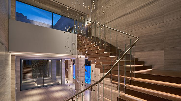 Image may contain: Architecture, Building, House, Housing, Staircase, Handrail, Indoors, and Interior Design