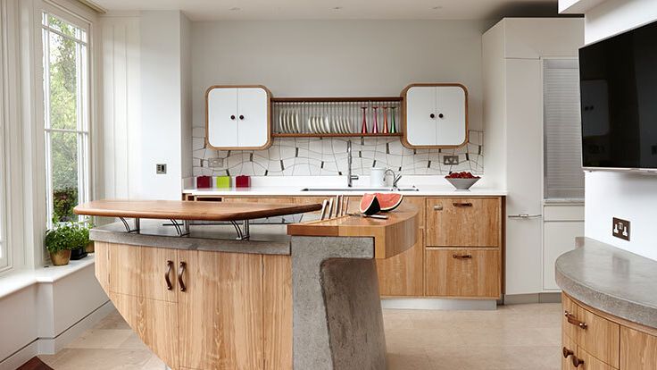 Image may contain: Indoors, Interior Design, Kitchen, Kitchen Island, Computer Hardware, Electronics, Hardware, and Monitor