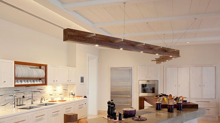 Image may contain: Indoors, Interior Design, Kitchen, Kitchen Island, Cup, Sink, Sink Faucet, Bread, and Food