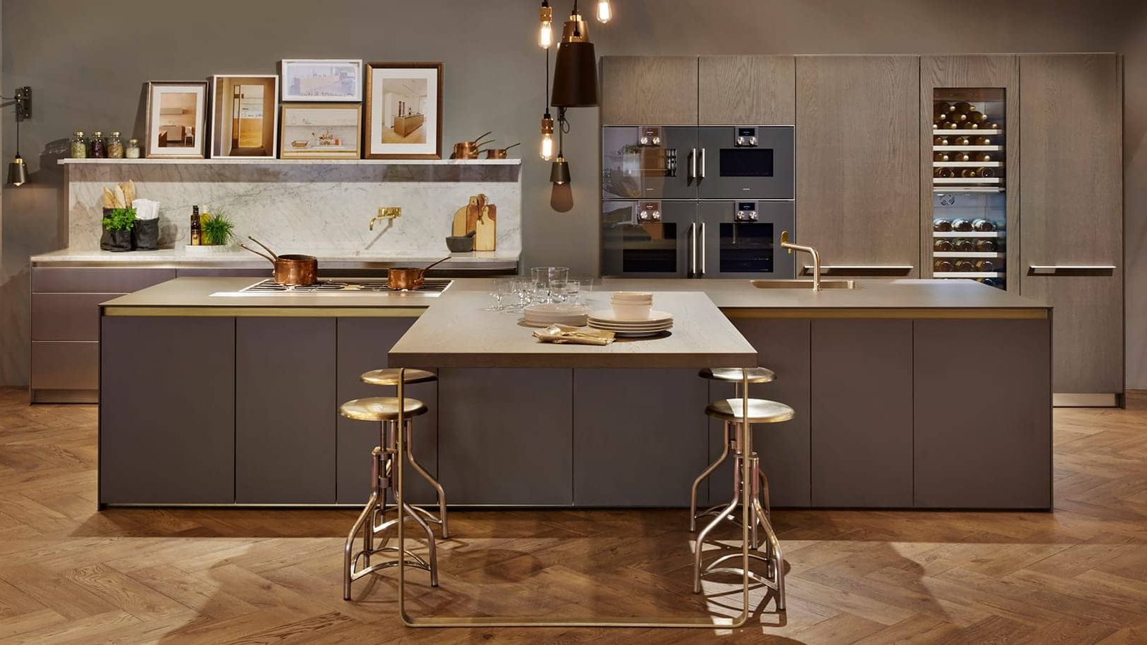 Image may contain: Indoors, Interior Design, Kitchen, Kitchen Island, Sink, Sink Faucet, and Furniture