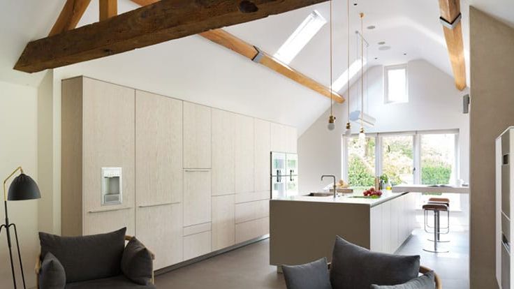 Image may contain: Indoors, Interior Design, Lamp, Home Decor, Architecture, Building, Furniture, Living Room, Room, and Sink