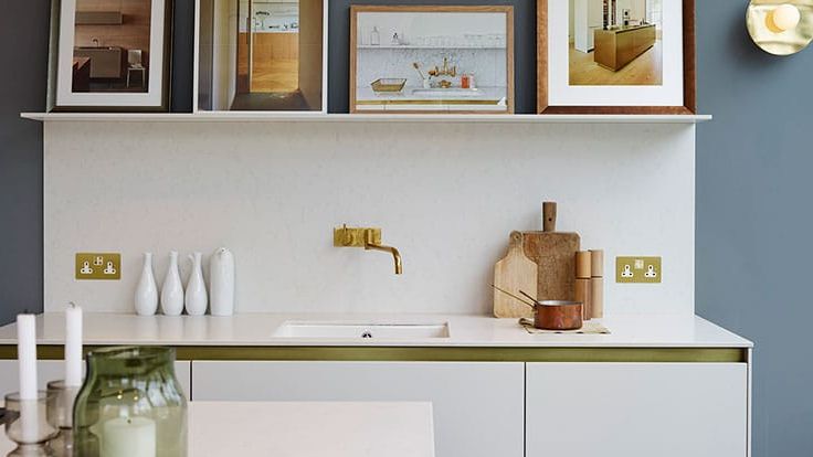 Image may contain: Shelf, Furniture, Table, Indoors, Interior Design, Art, Painting, Chair, Sink, Candle, Desk, and Lamp