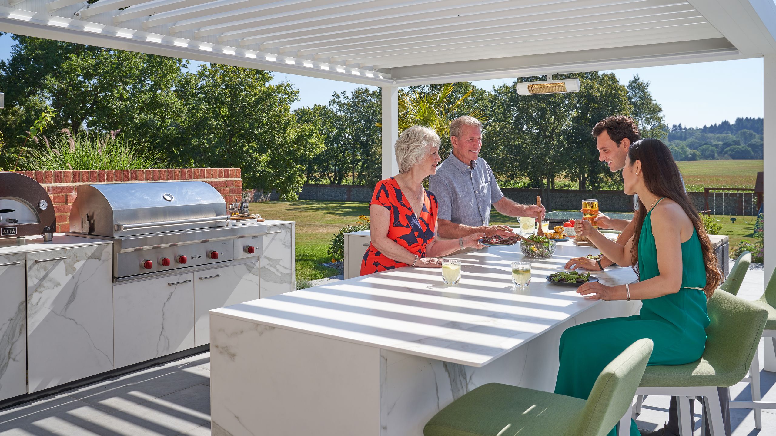 Image may contain: Cup, Adult, Person, Chair, Furniture, Table, Outdoors, Architecture, Building, House, Housing, and Patio