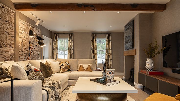 Image may contain: Home Decor, Coffee Table, Furniture, Table, Architecture, Building, Indoors, Living Room, Room, and Couch