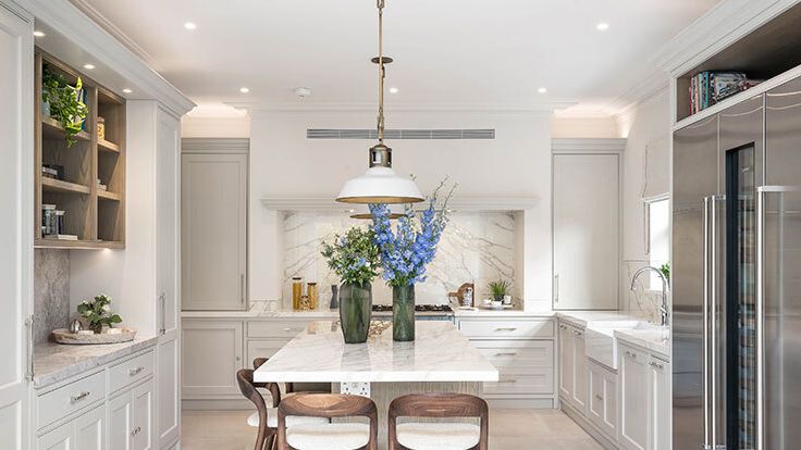 Image may contain: Architecture, Building, Dining Room, Dining Table, Furniture, Indoors, Room, Table, and Kitchen