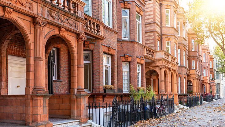 Image may contain: Architecture, Building, Housing, House, Row House, Bicycle, Transportation, Vehicle, Plant, and City