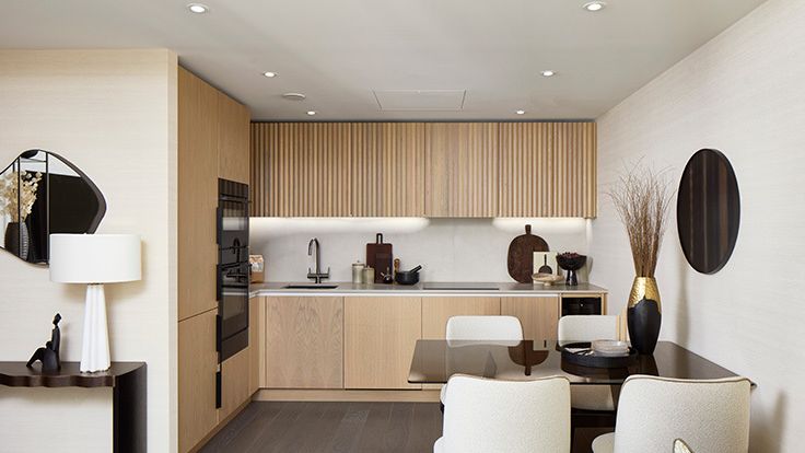 Image may contain: Indoors, Interior Design, Lamp, Home Decor, Chair, Furniture, Sink, Sink Faucet, and Architecture