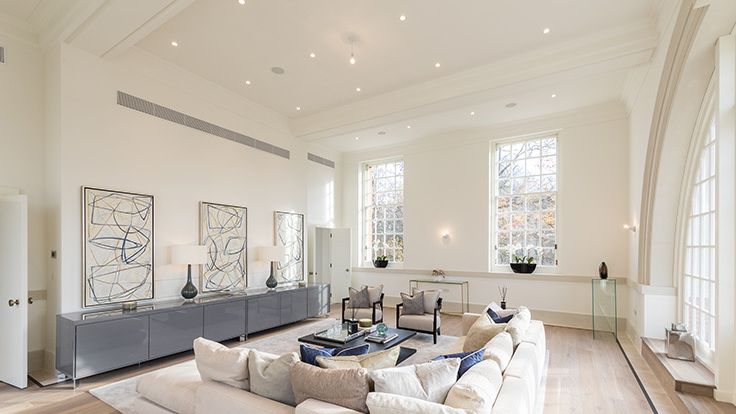 Image may contain: Home Decor, Lamp, Architecture, Building, Furniture, Indoors, Living Room, Room, and Interior Design