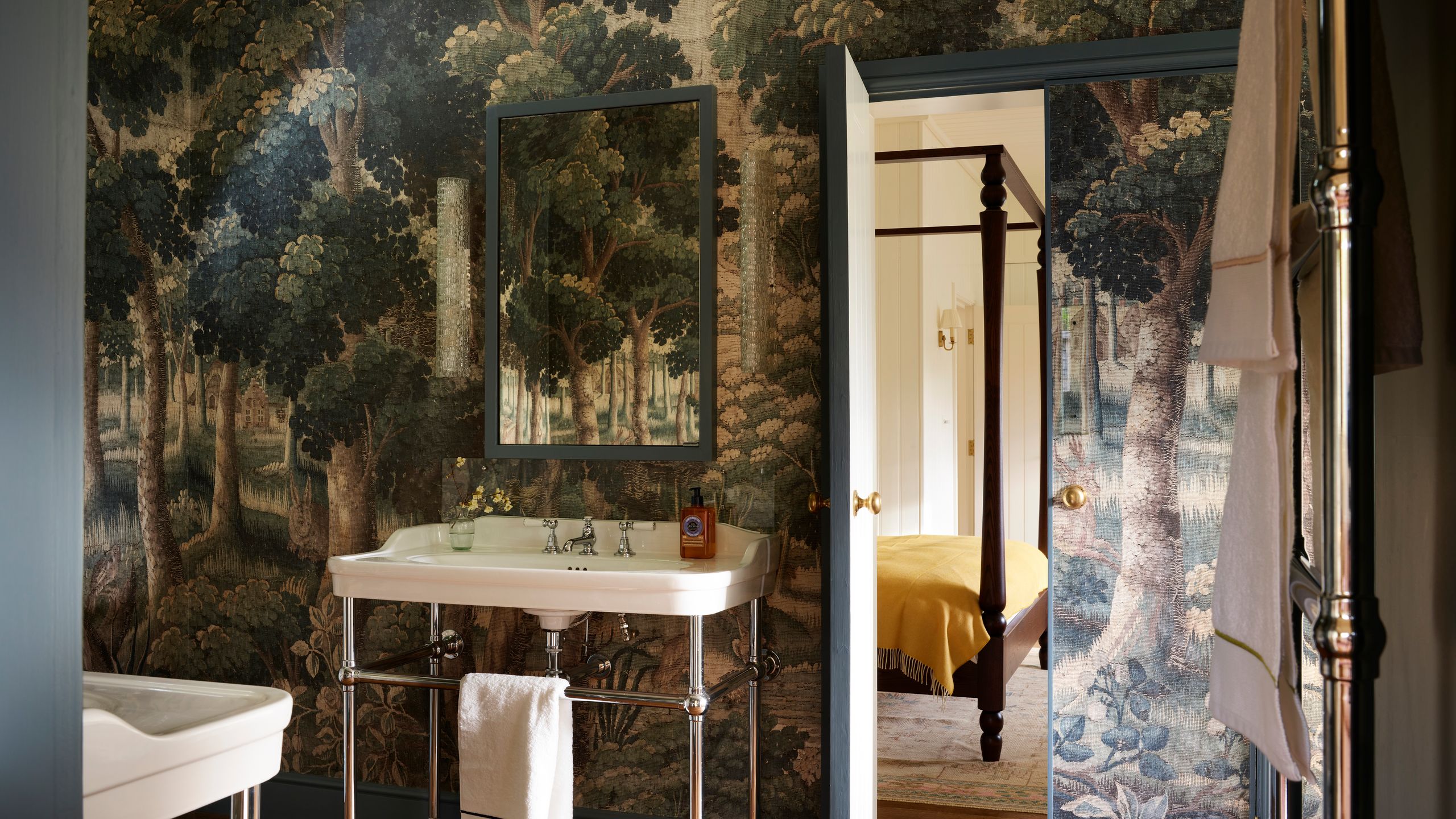 Image may contain: Indoors, Interior Design, Sink, Sink Faucet, Art, Painting, Bed, and Furniture