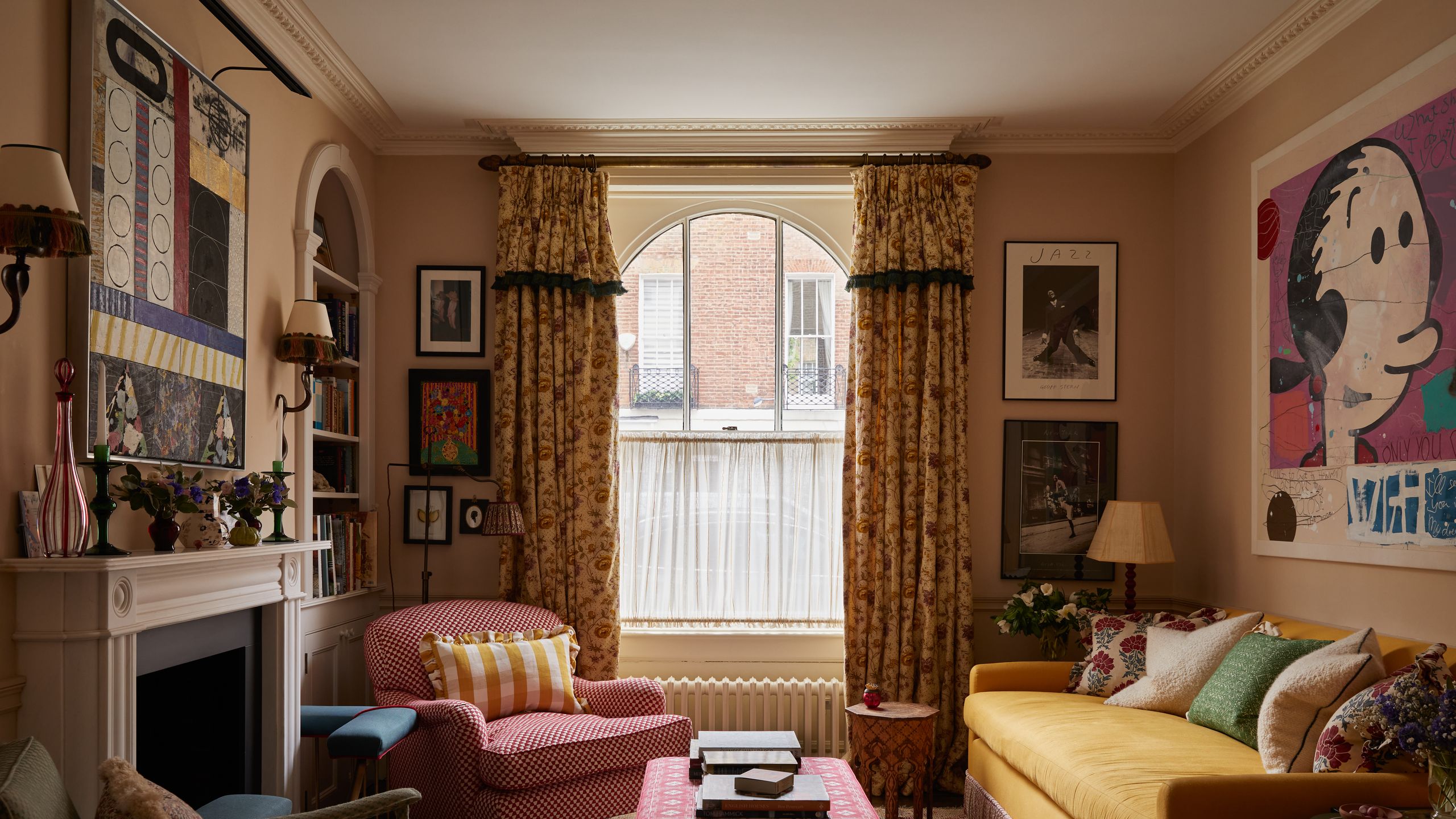 Image may contain: Architecture, Building, Furniture, Indoors, Living Room, Room, Home Decor, Lamp, Couch, Chair, and Art