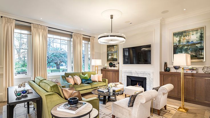 Image may contain: Home Decor, Book, Publication, Lamp, Furniture, Table, Couch, Art, Painting, Architecture, and Building