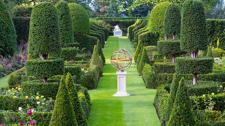 Image may contain: Garden, Nature, Outdoors, Grass, Park, Plant, Fence, Hedge, and Arbour