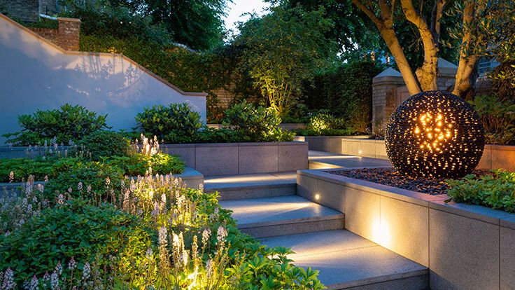 Image may contain: Backyard, Nature, Outdoors, Yard, Garden, Grass, Plant, Vegetation, and Person