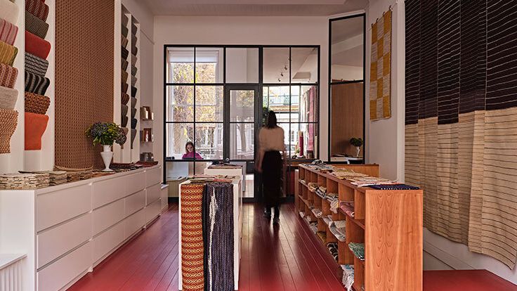 Image may contain: Indoors, Interior Design, Home Decor, Floor, Person, Flooring, Wood, Plant, Kitchen, Hardwood, and Rug