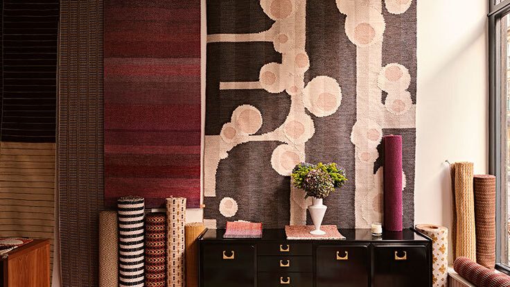 Image may contain: Furniture, Sideboard, Indoors, Interior Design, Home Decor, Rug, Bench, Candle, Desk, and Table