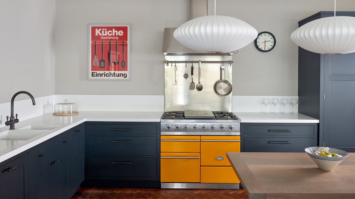 Image may contain: Indoors, Kitchen, Sink, Sink Faucet, Interior Design, Cooktop, Cutlery, Spoon, and Lamp