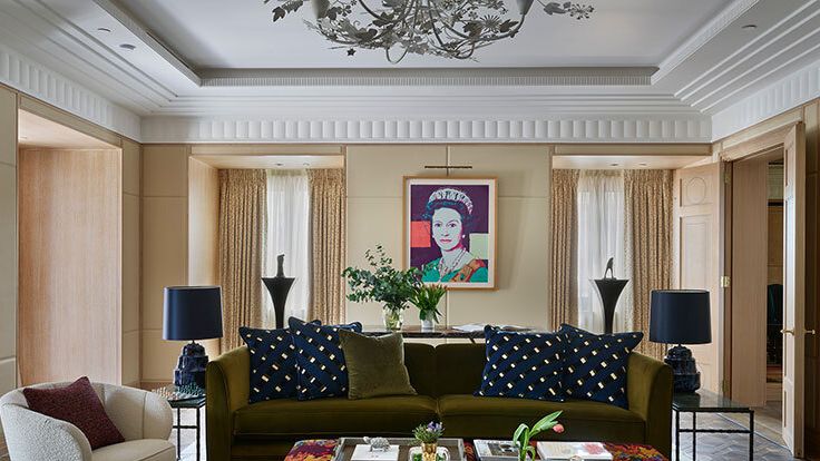 Image may contain: Home Decor, Lamp, Couch, Furniture, Architecture, Building, Indoors, Living Room, and Room