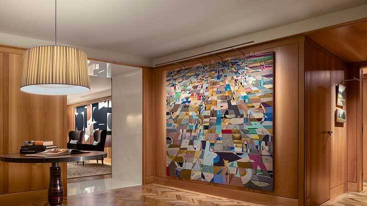 Image may contain: Indoors, Interior Design, Desk, Furniture, Table, and Lamp