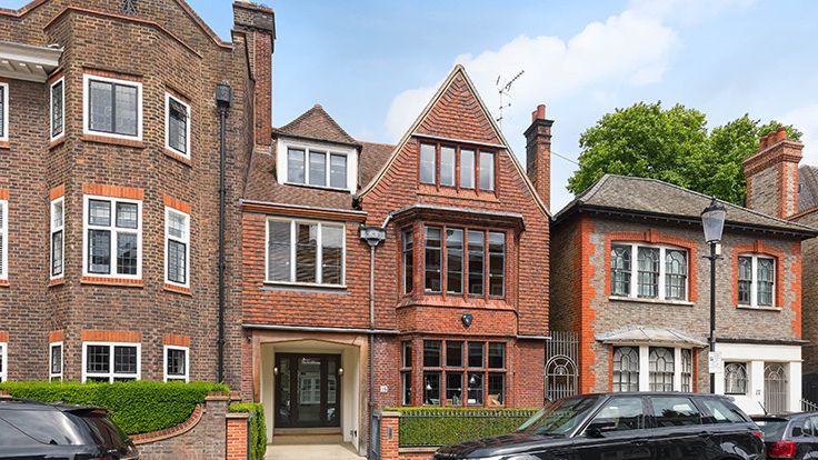 Image may contain: Architecture, Building, Housing, Car, Transportation, Vehicle, House, and Row House