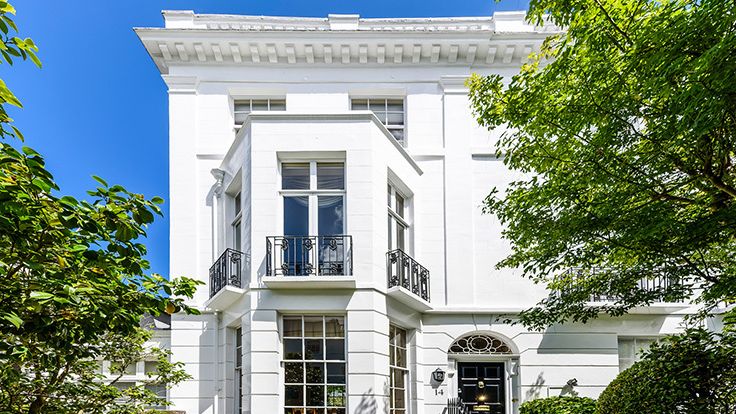 Image may contain: Architecture, Building, Housing, House, and Portico