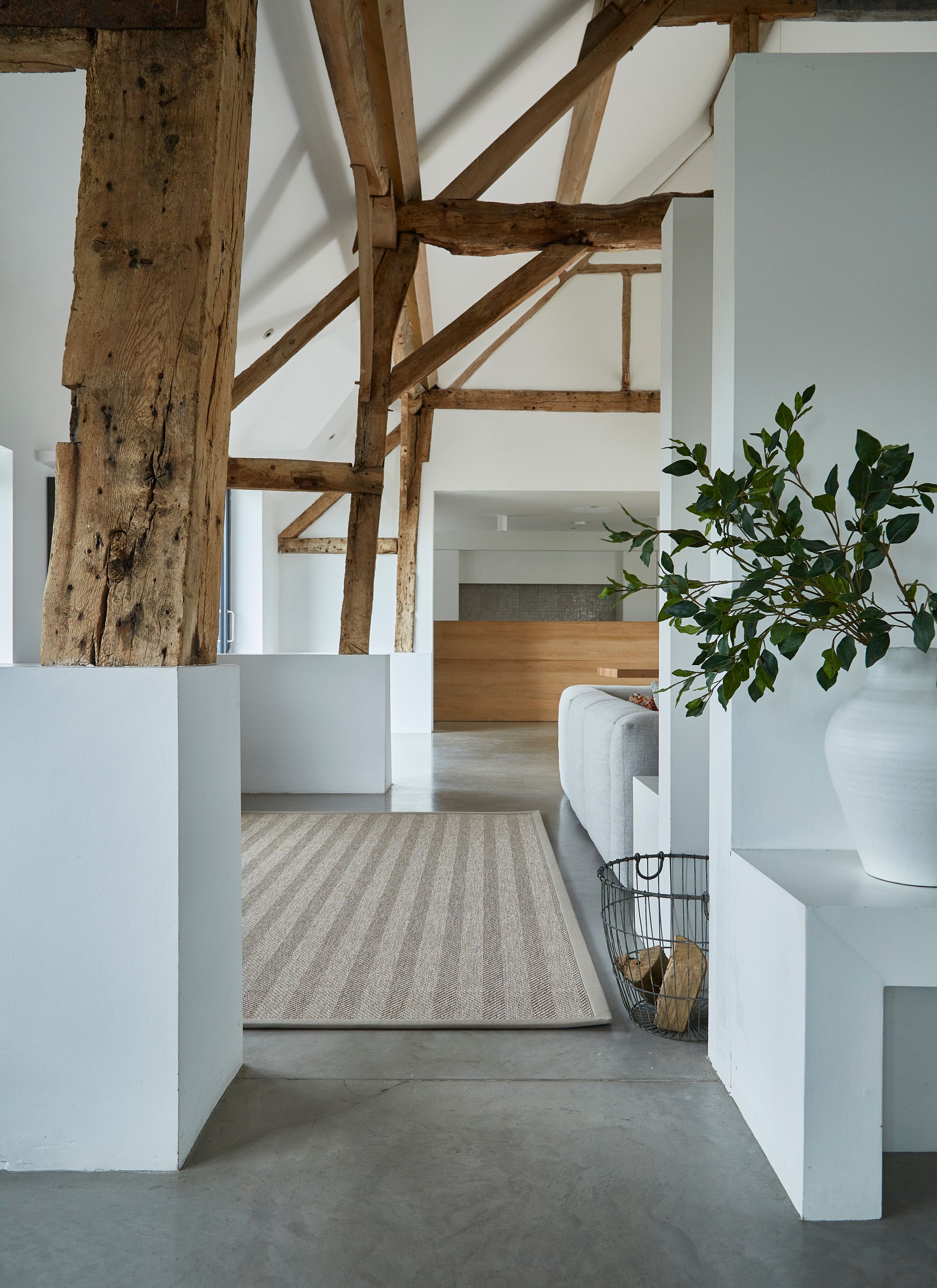 Image may contain: Floor, Indoors, Interior Design, Flooring, Wood, Plant, Home Decor, and Rug