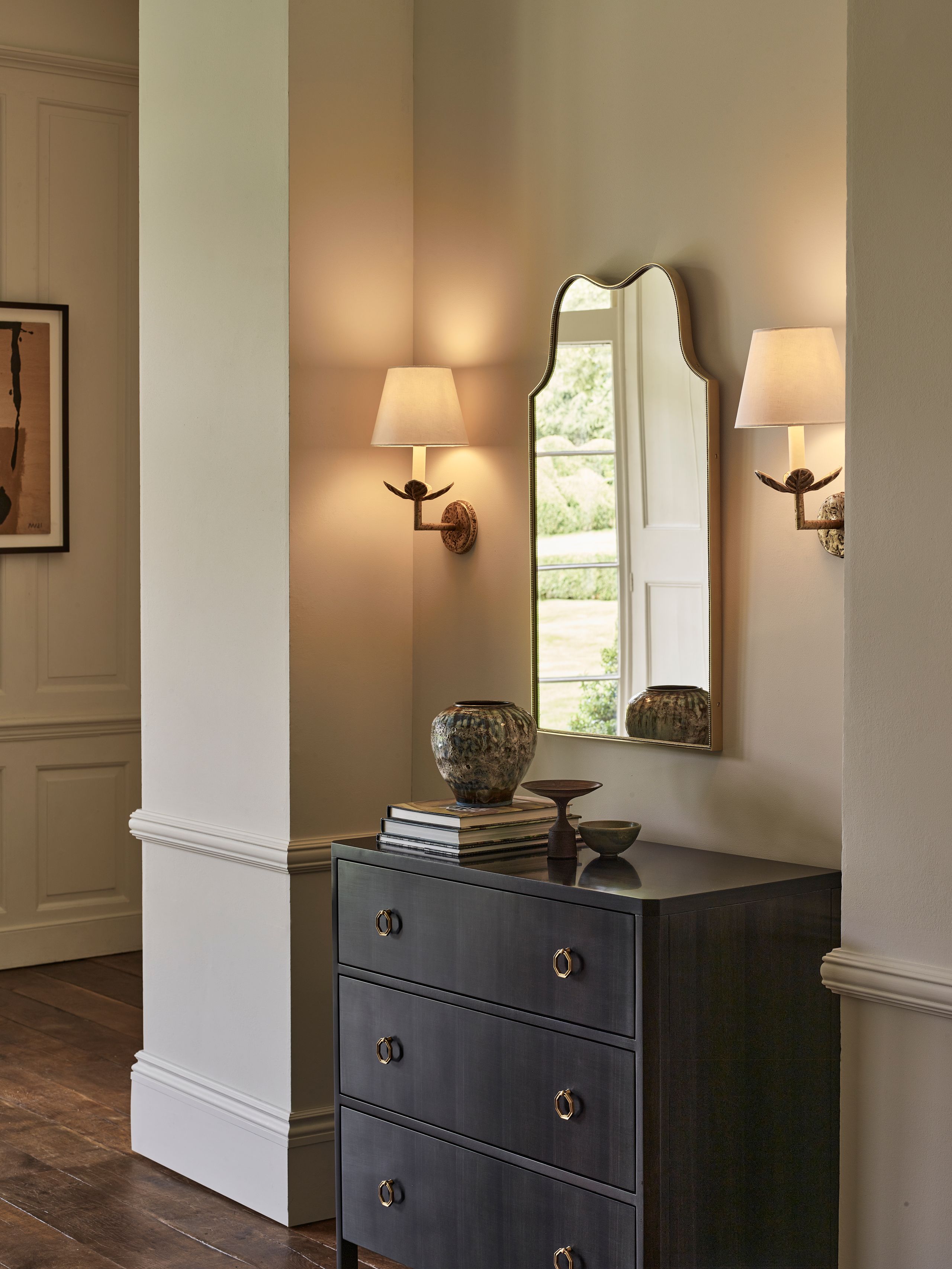 Image may contain: Lamp, Furniture, Art, Painting, Indoors, Interior Design, Cabinet, and Chest Of Drawers