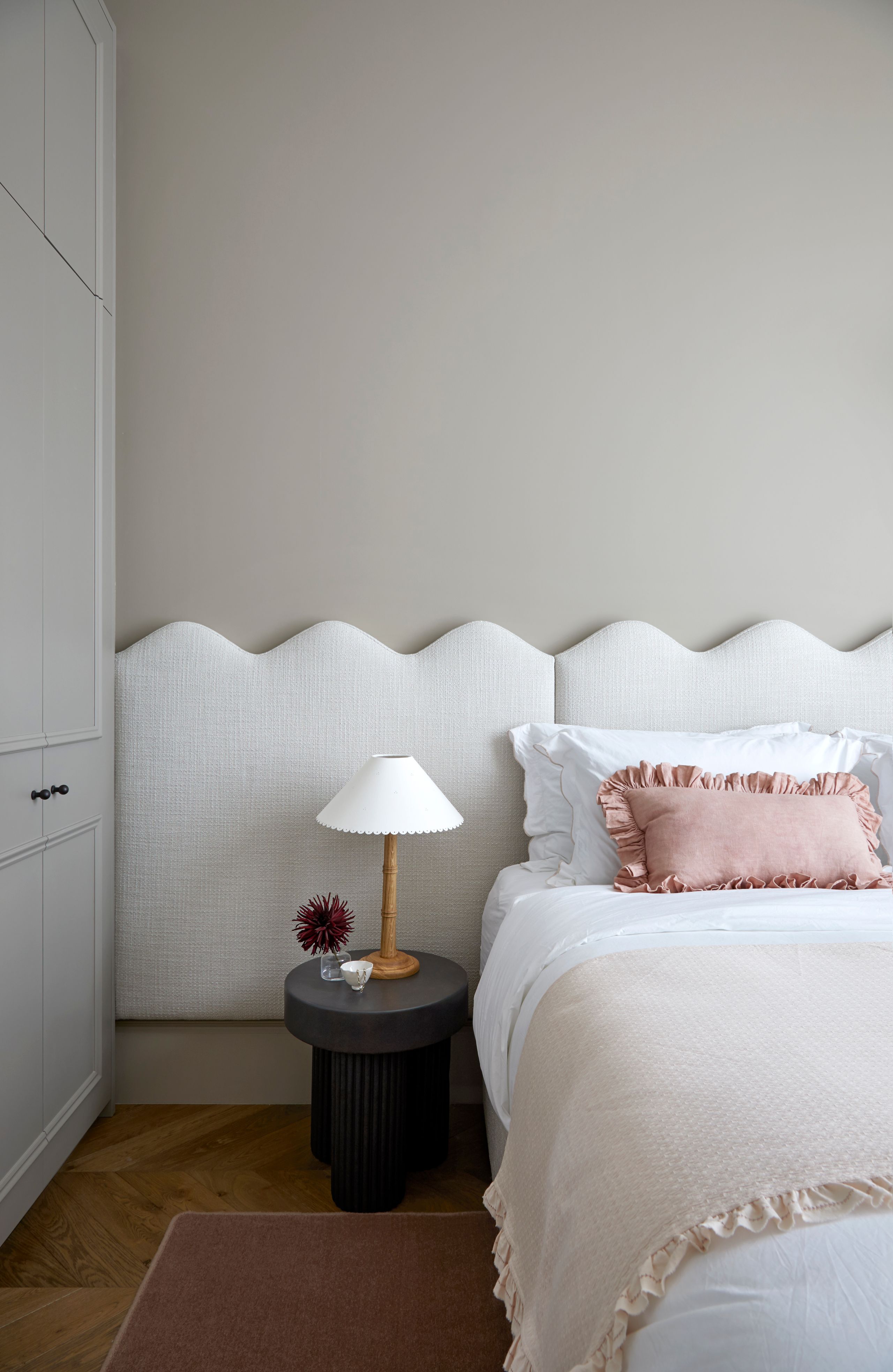 Image may contain: Cushion, Home Decor, Lamp, Indoors, Interior Design, Pillow, Table Lamp, Rug, Bed, and Furniture