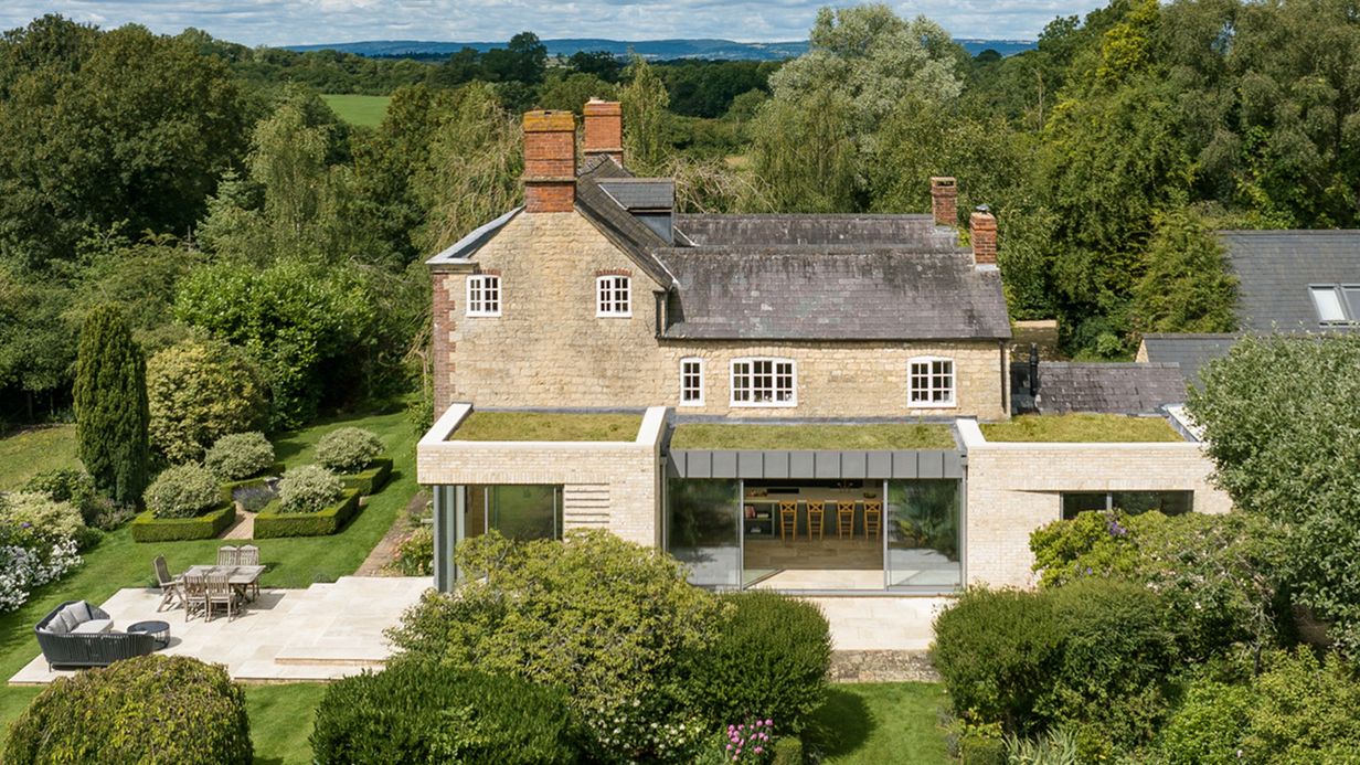 Image may contain: Architecture, Building, Housing, House, Outdoors, Manor, and Aerial View