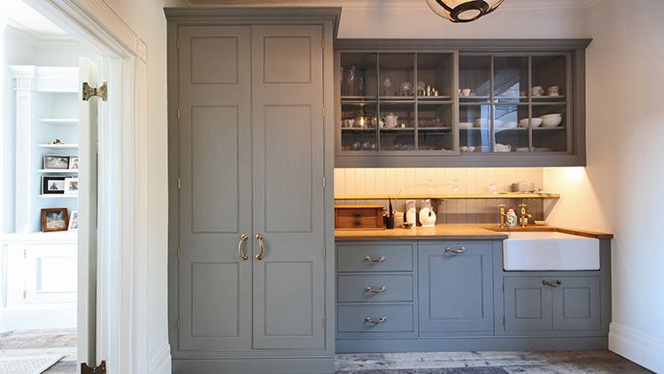 Image may contain: Indoors, Interior Design, Corner, Cabinet, Furniture, Lamp, Art, Painting, Kitchen, Closet, and Cupboard