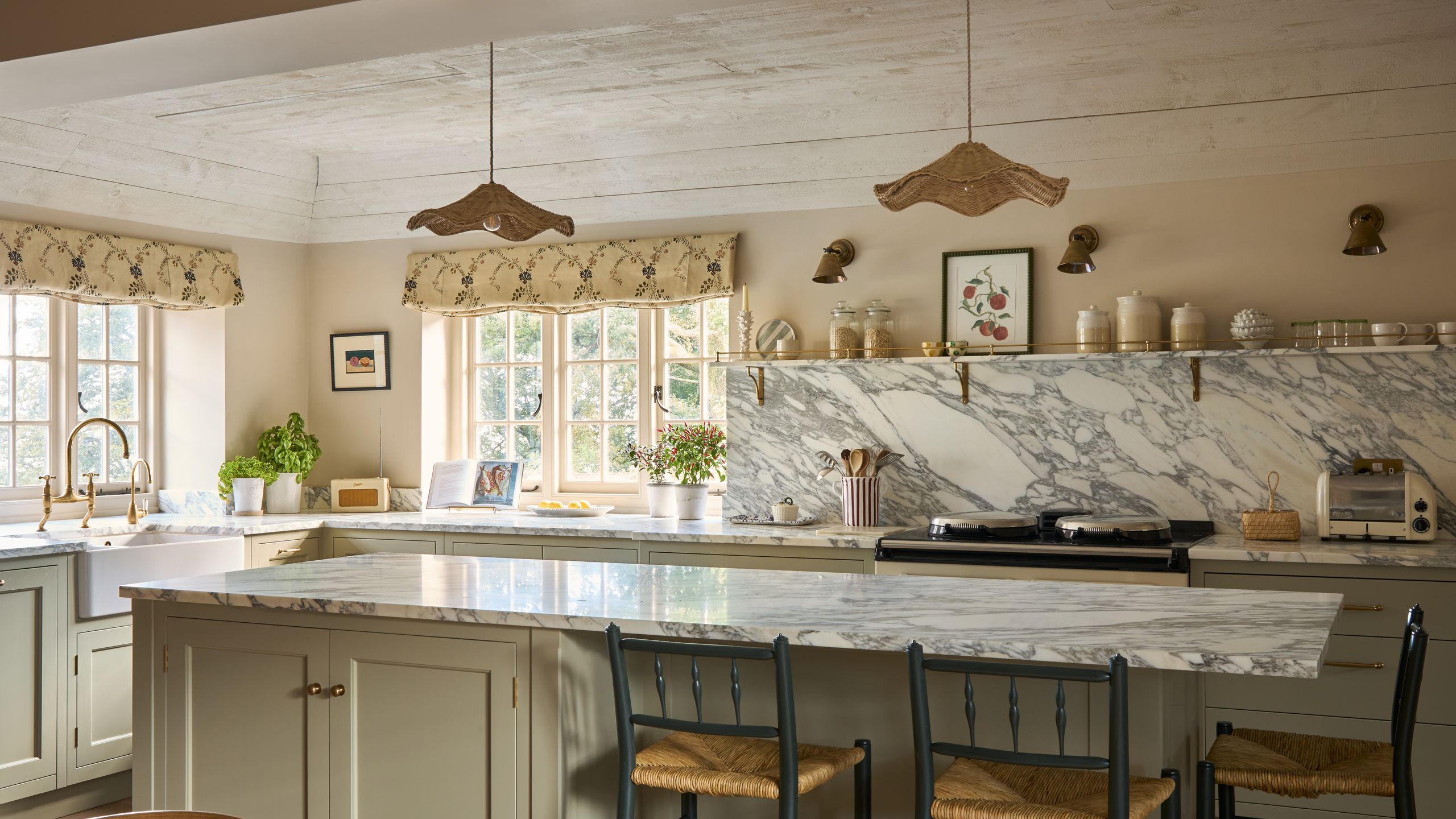 Image may contain: Indoors, Interior Design, Kitchen, Kitchen Island, Chair, and Furniture